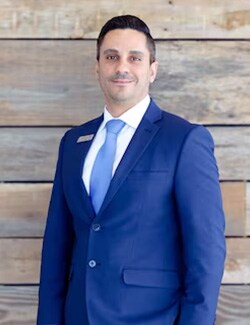Staff member Sam Sardini from 028080548909