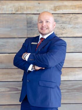 Staff member Cesar Arrambide from 028080548909