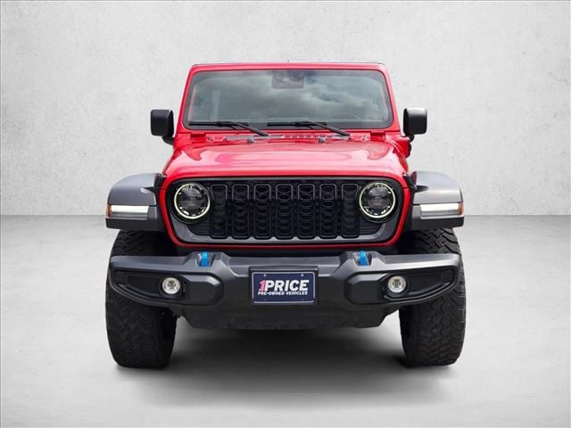 Used 2024 Jeep Wrangler 4xe Willys 4XE with VIN 1C4RJXN65RW316854 for sale in Conroe, TX