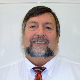 Staff member Norm Belzil from ID_bda8e4