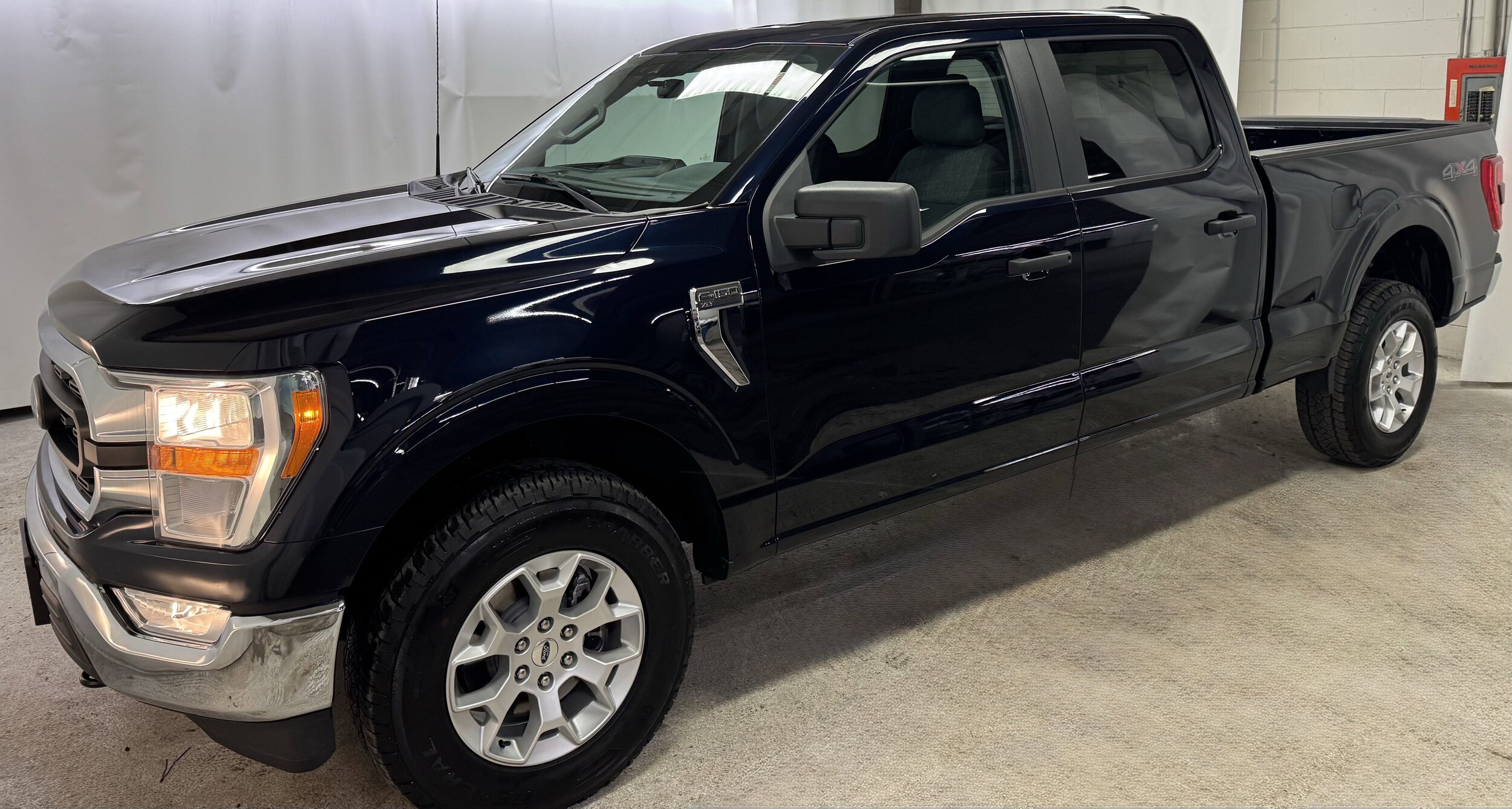 Used 2022 Ford F-150 XLT with VIN 1FTFW1E52NKD00234 for sale in Arlington, MA