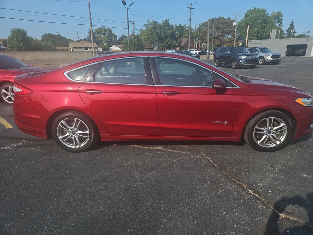 Used 2015 Ford Fusion Hybrid Titanium with VIN 3FA6P0RU8FR101765 for sale in Dearborn, MI