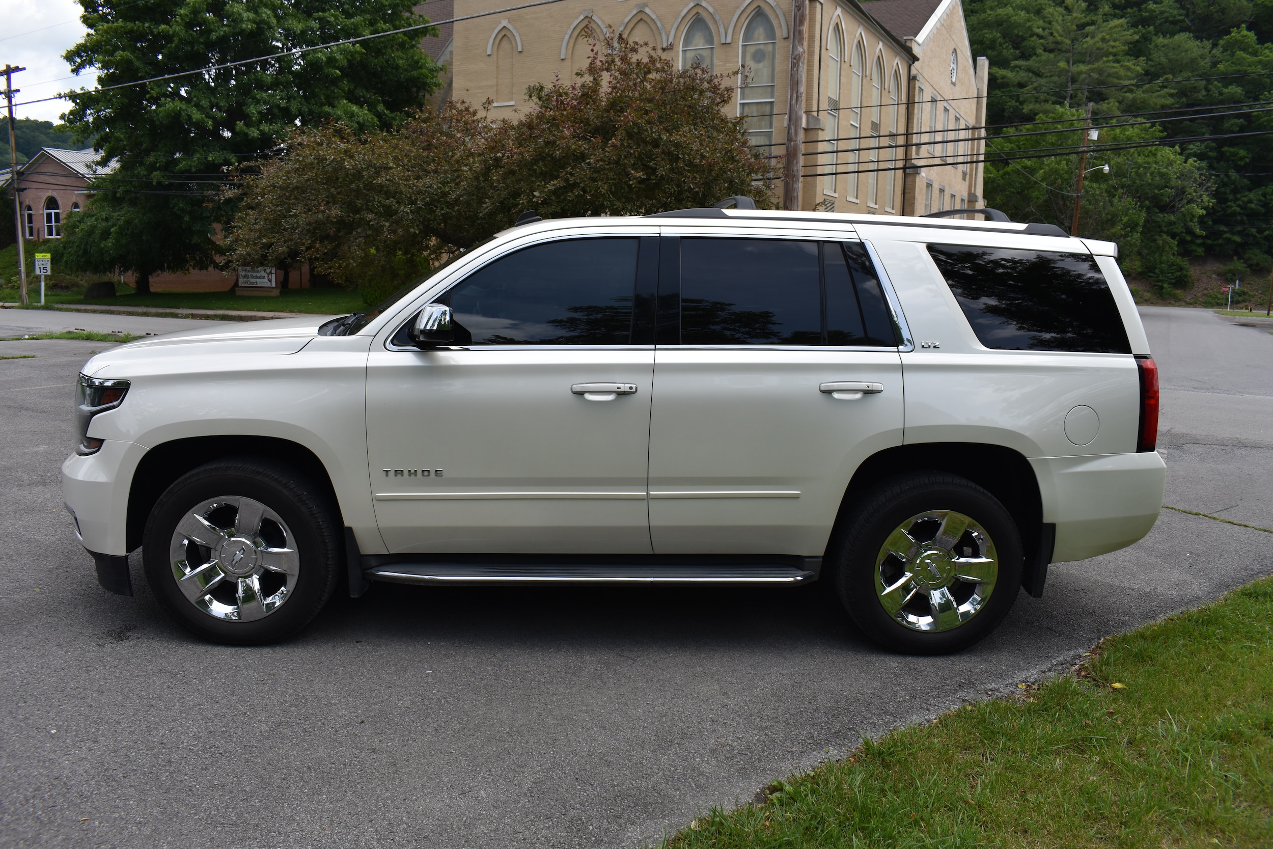 Used 2015 Chevrolet Tahoe LTZ with VIN 1GNSKCKCXFR197900 for sale in Marlinton, WV