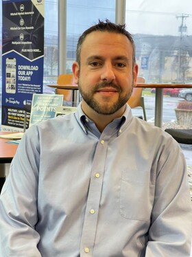Staff member Nicholas Hurley from 37a859f07992