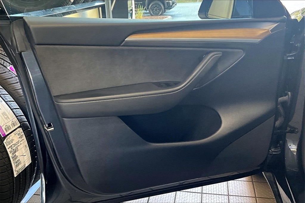 Used 2024 Tesla Model Y Long Range with VIN 7SAYGDED7RA330878 for sale in Fort Myers, FL