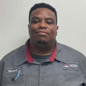 Staff member Rasheed Hewitt from ID_d4e2d2