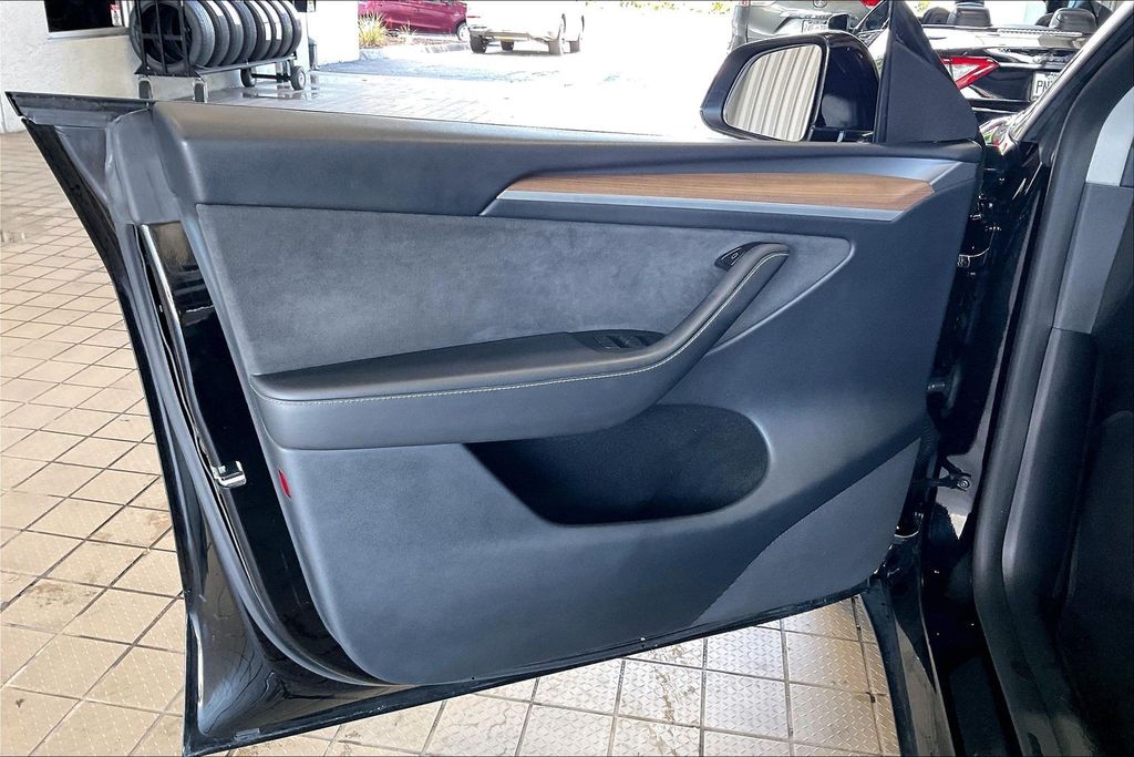 Used 2023 Tesla Model Y Long Range with VIN 7SAYGDEE7PA178932 for sale in Fort Myers, FL