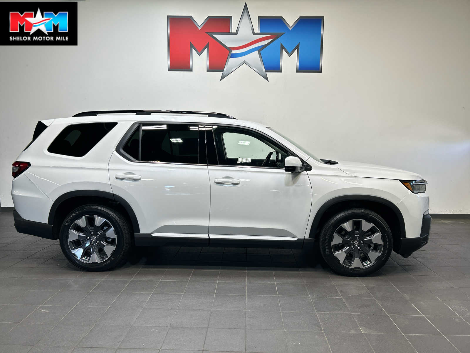 2026 Honda Pilot Touring AWD's photo