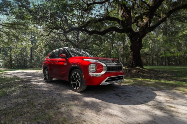 Red Mitsubishi Outlander Plug-in Hybrid low angle side profile