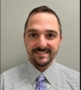 Staff member Eric Barton from ID_67644c386972