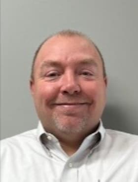 Staff member Travis Dometrorch from ID_c0aa69515e79
