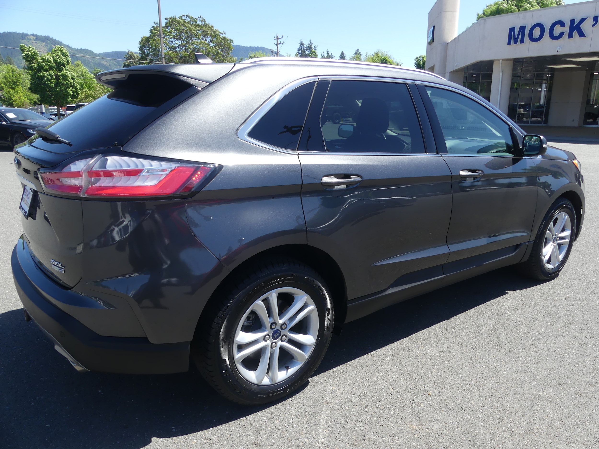 Used 2020 Ford Edge SEL with VIN 2FMPK4J98LBB57058 for sale in Grants Pass, OR