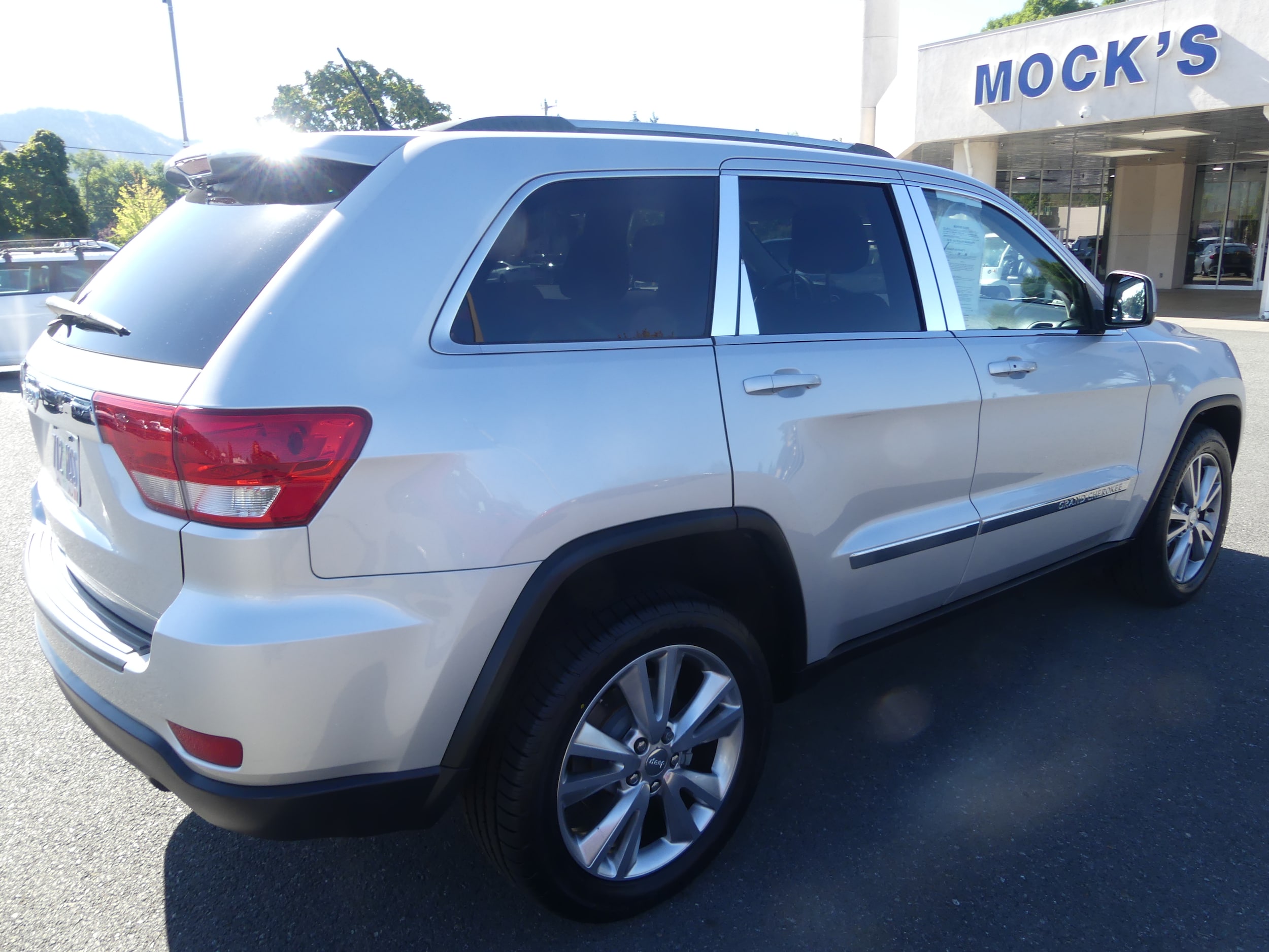 Used 2012 Jeep Grand Cherokee Laredo with VIN 1C4RJFAG2CC256095 for sale in Grants Pass, OR