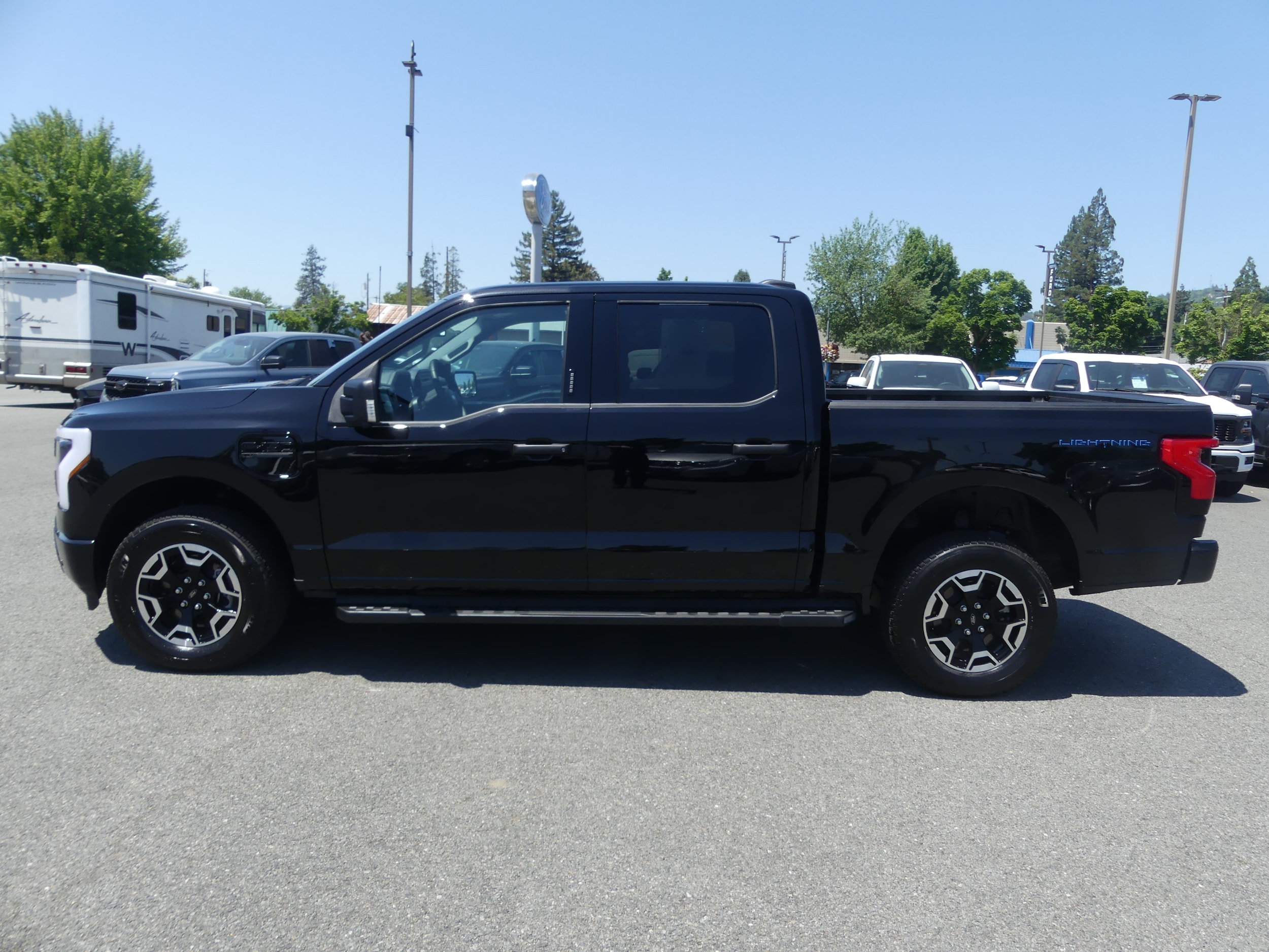 Used 2023 Ford F-150 Lightning XLT with VIN 1FTVW1EL5PWG51239 for sale in Grants Pass, OR