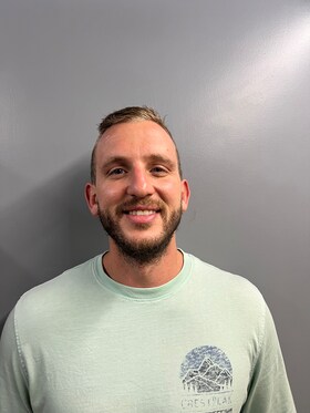 Staff member Caleb Hofer from 416a9a11931d