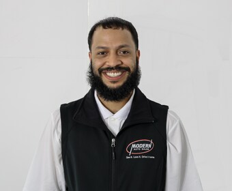 Staff member Wilfredo Santiago from ID_3b3b1a87dfa4