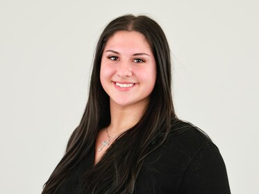 Staff member Gianna Dufresne from ID_3b3b1a87dfa4