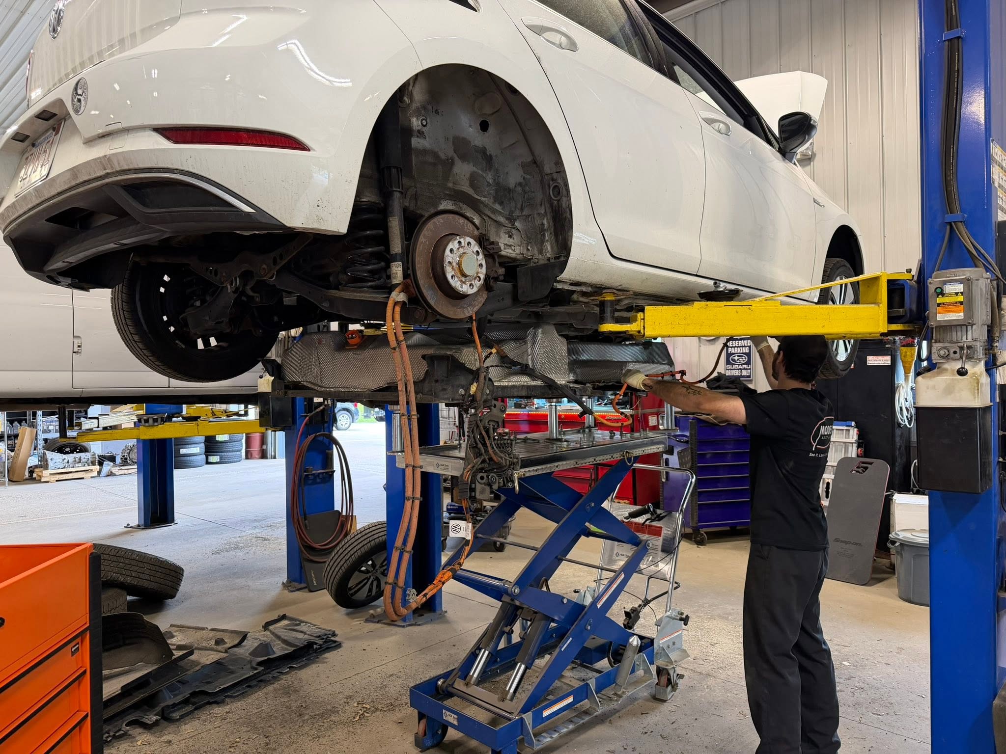 EV and hybrid repair being performed at Modern Auto Sales service center in Tyngsboro, MA