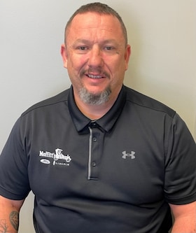 Staff member Travis from ID_daf38e206a69