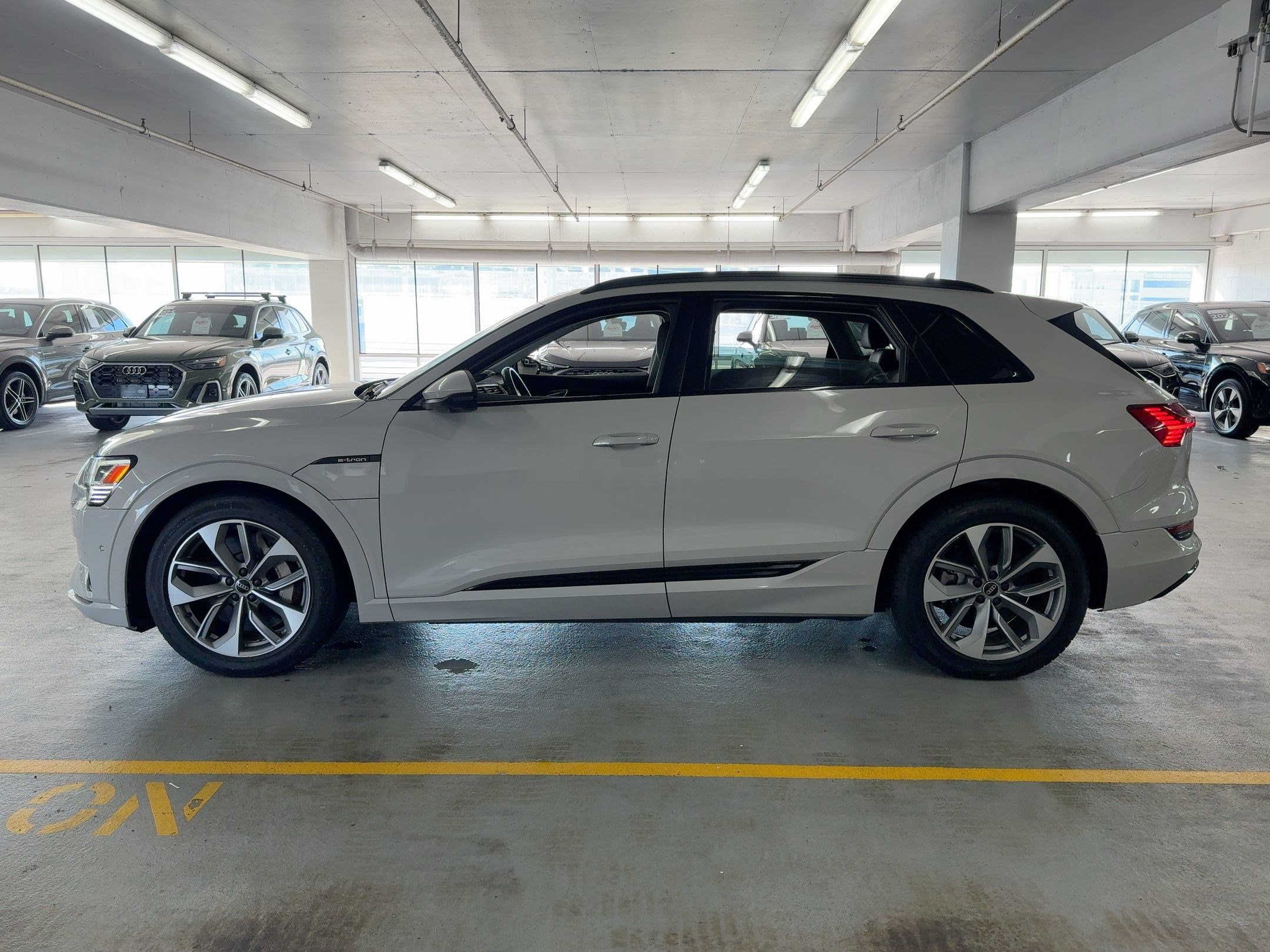 Used 2021 Audi e-tron Premium Plus with VIN WA1LAAGE8MB027744 for sale in Houston, TX