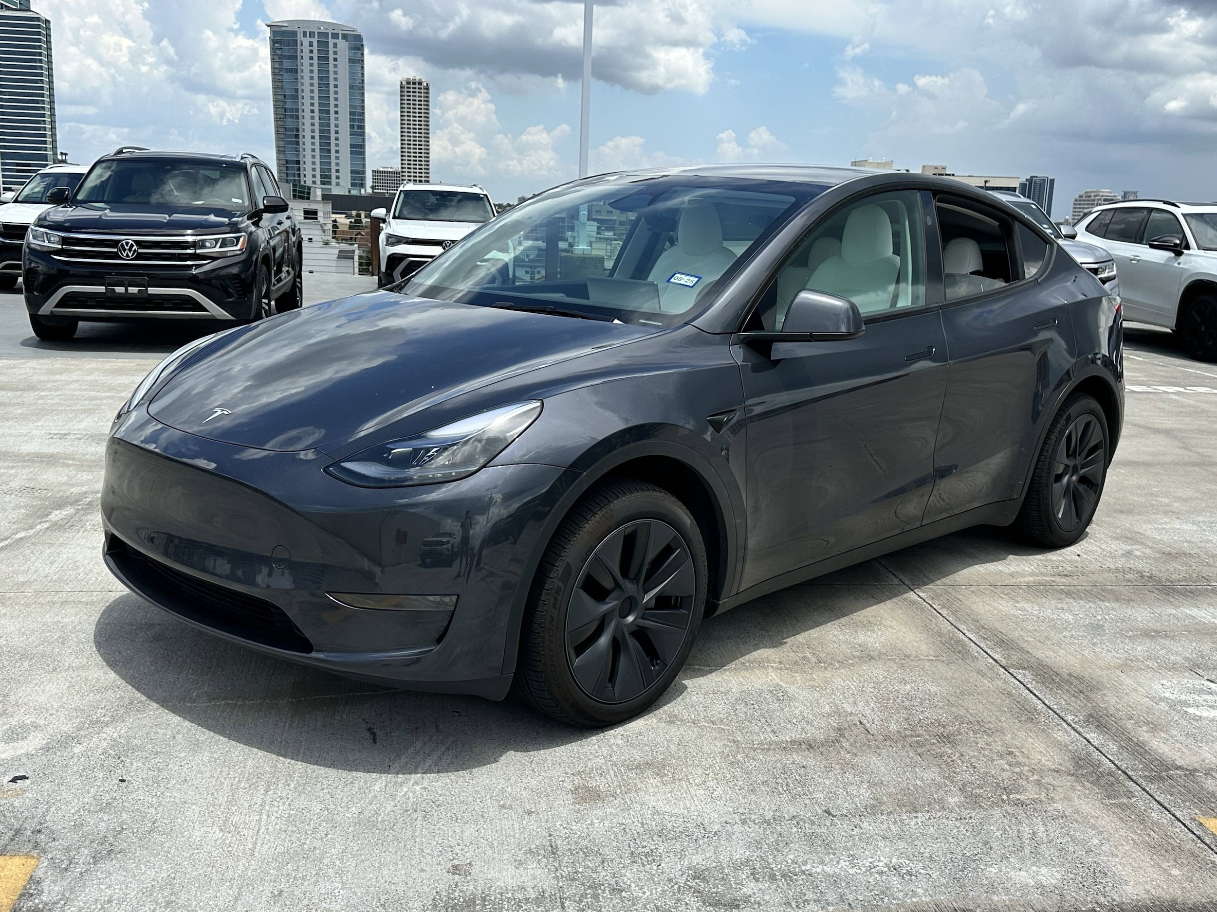 Used 2024 Tesla Model Y Long Range with VIN 7SAYGDED3RA327718 for sale in Houston, TX