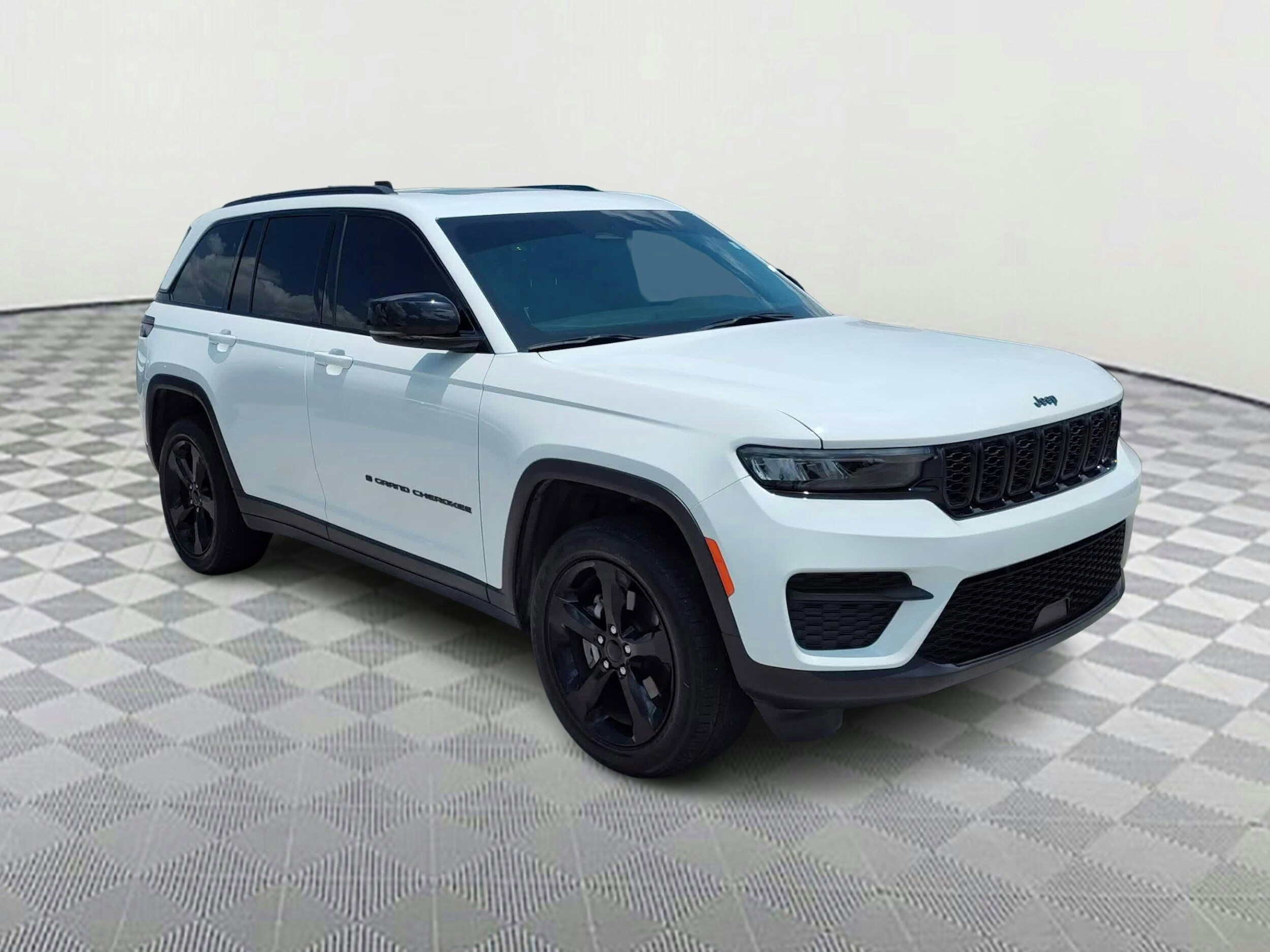 Used 2023 Jeep Grand Cherokee Altitude with VIN 1C4RJHAG8PC562493 for sale in Houston, TX