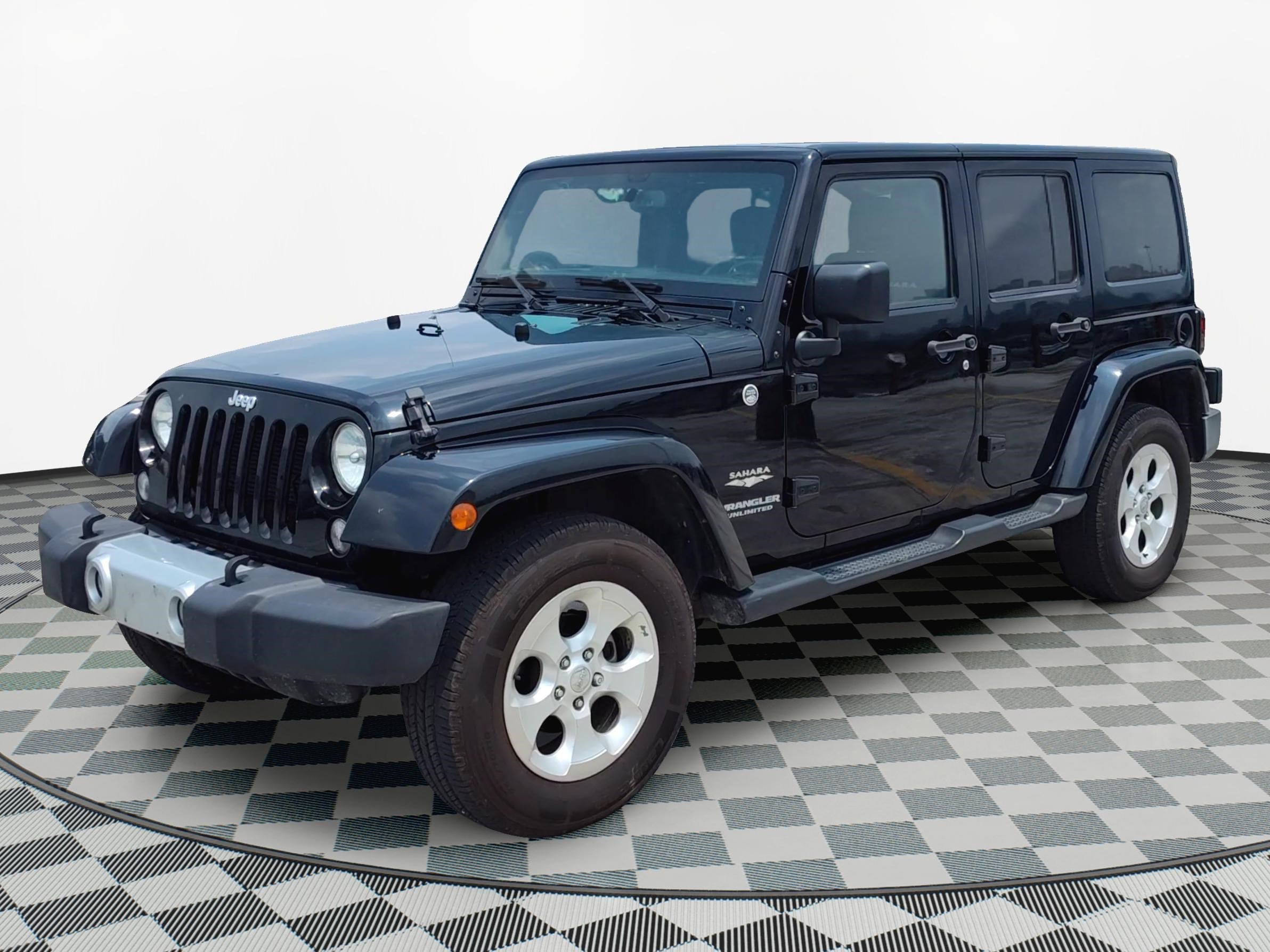 Used 2015 Jeep Wrangler Unlimited Sahara with VIN 1C4BJWEG8FL545059 for sale in Houston, TX