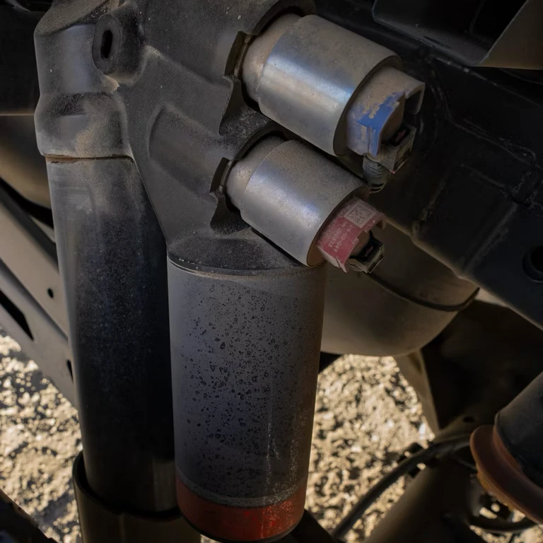 Close-up of Fox Racing Shox dual-live valve shock absorber.