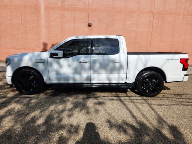 Used 2022 Ford F-150 Lightning Lariat with VIN 1FTVW1EL3NWG14543 for sale in Akron, OH