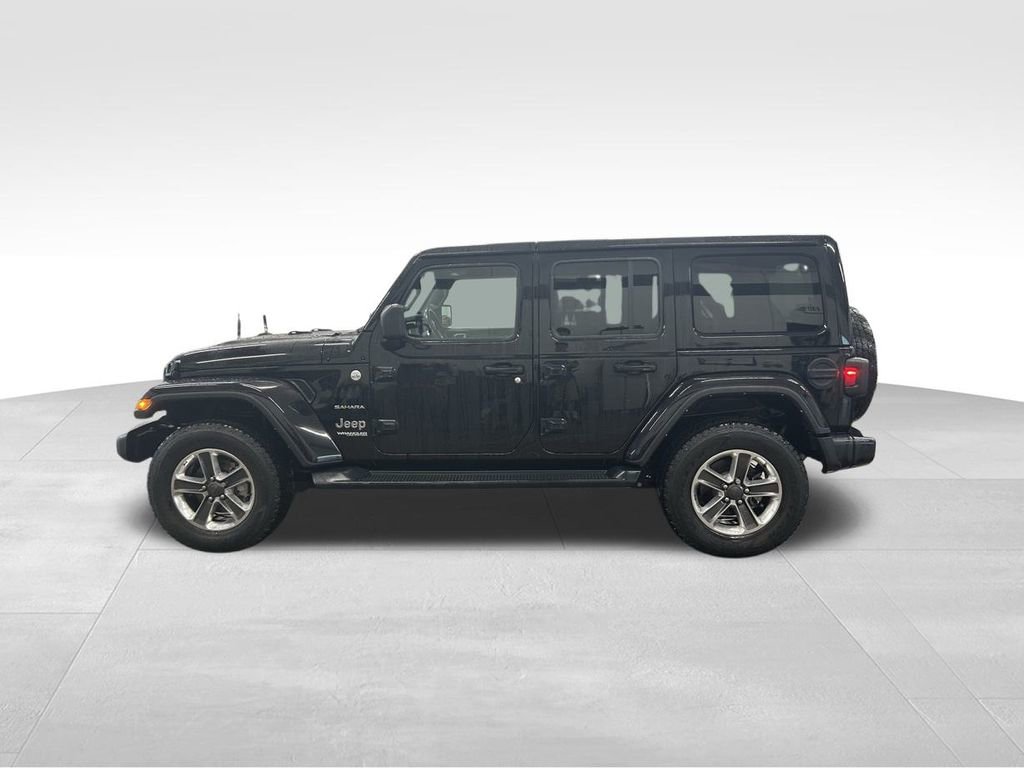 Used 2021 Jeep Wrangler Unlimited Sahara with VIN 1C4HJXEN6MW808580 for sale in Ashtabula, OH