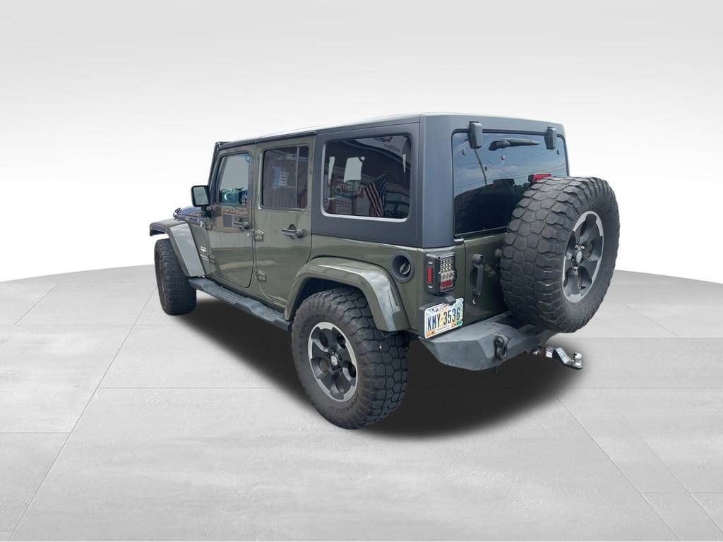 Used 2015 Jeep Wrangler Unlimited Sahara with VIN 1C4BJWEGXFL717401 for sale in Ashtabula, OH