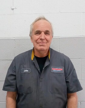 Staff member John Kandre from ID_5af4e9