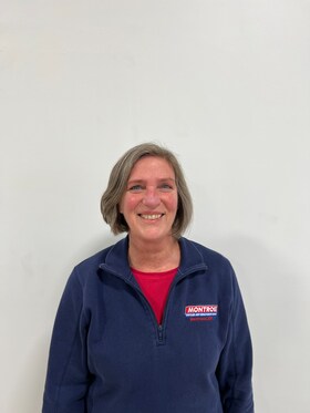 Staff member Ann Richards from ID_5af4e9