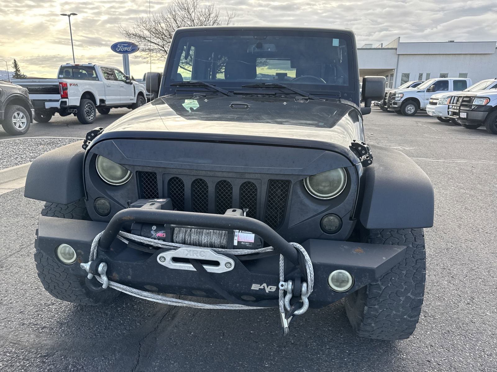 Used 2014 Jeep Wrangler Unlimited Sport with VIN 1C4BJWDG8EL133563 for sale in Montrose, CO