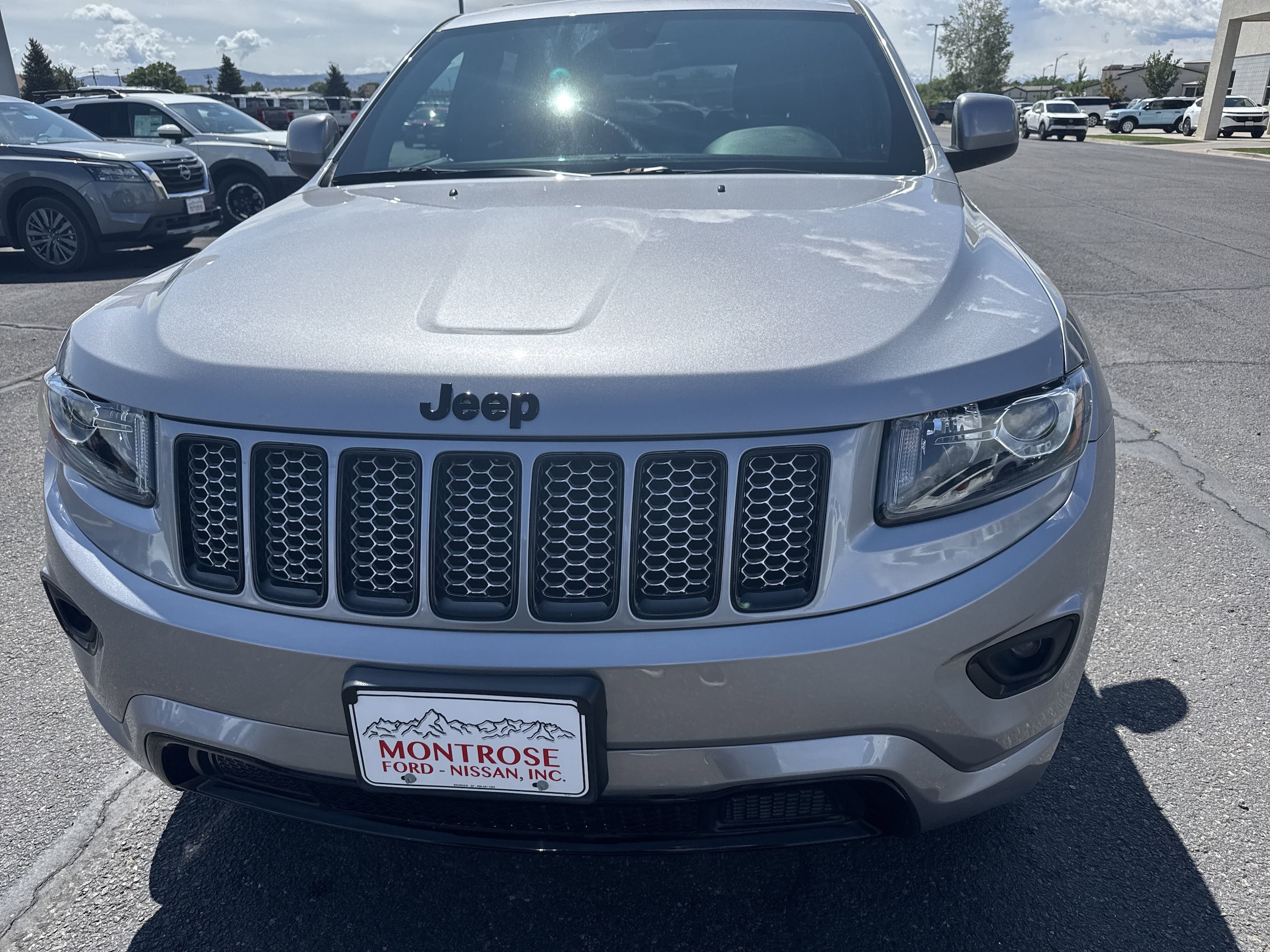 Used 2015 Jeep Grand Cherokee Altitude with VIN 1C4RJFAG9FC934264 for sale in Montrose, CO