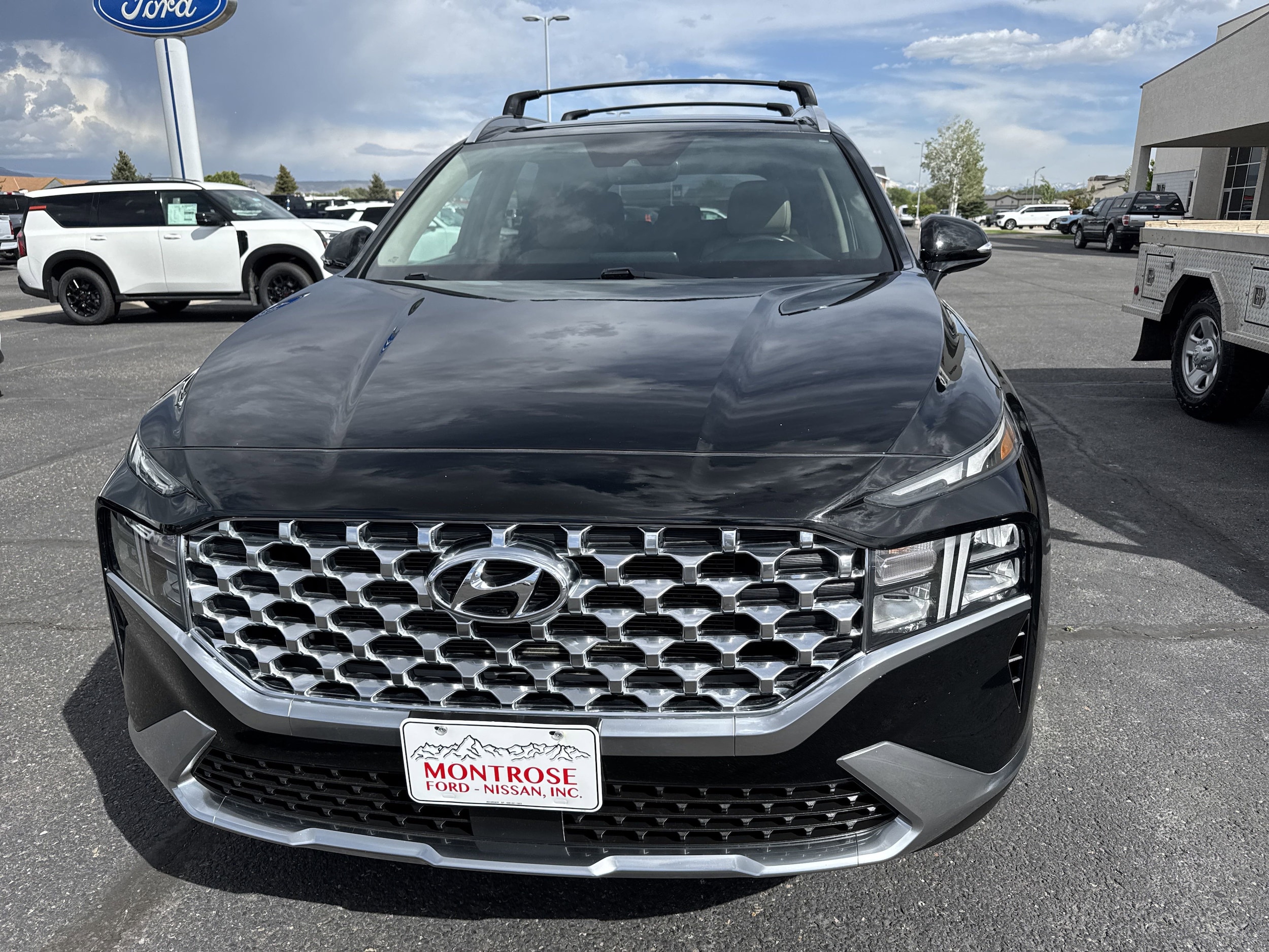 Used 2022 Hyundai Santa Fe SEL with VIN 5NMS3DAJXNH405921 for sale in Montrose, CO