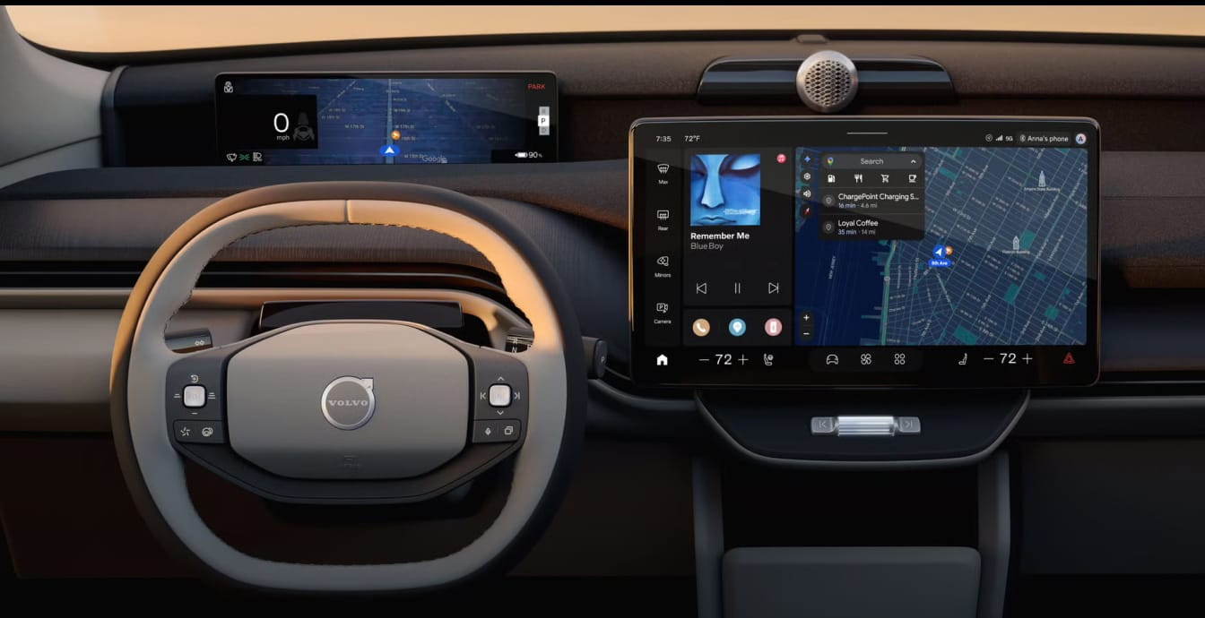The image shows a 2026 Volvo EX60 SUV interior with dashboard with a sleek steering wheel and two digital displays.