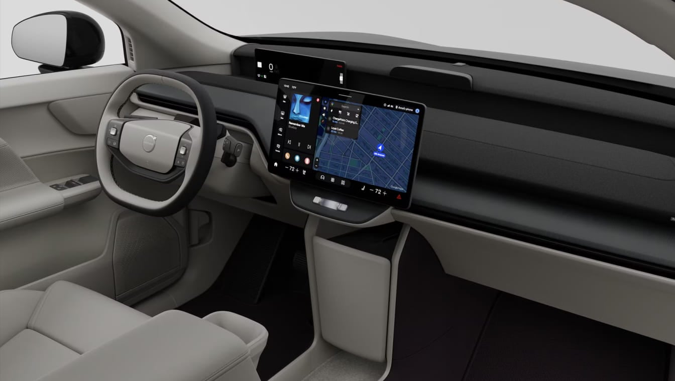 2026 Volvo EX60 SUV featuring a sleek dashboard with a digital display showing navigation.