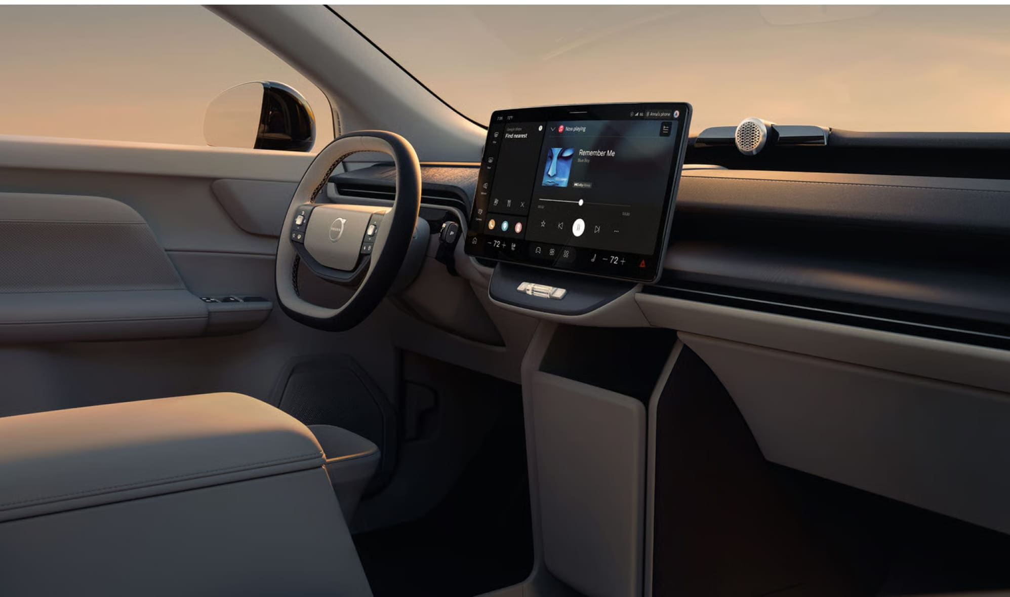 2027 Volvo EX60 features a large touchscreen displaying music and a minimalist dashboard at sunset.