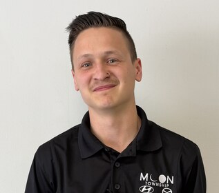 Staff member Andrew Jesserer from ID_711117