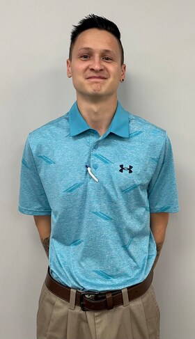 Staff member Andrew Jesserer from ID_711117