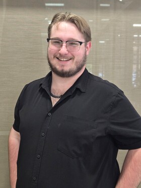 Staff member ETHAN ALLEMAN from ID_8b09c9