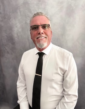 Staff member Lynn Selby from d7011ea84b86