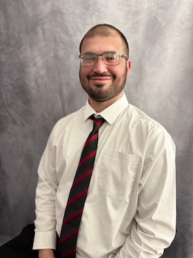 Staff member Matthew Rios from d7011ea84b86