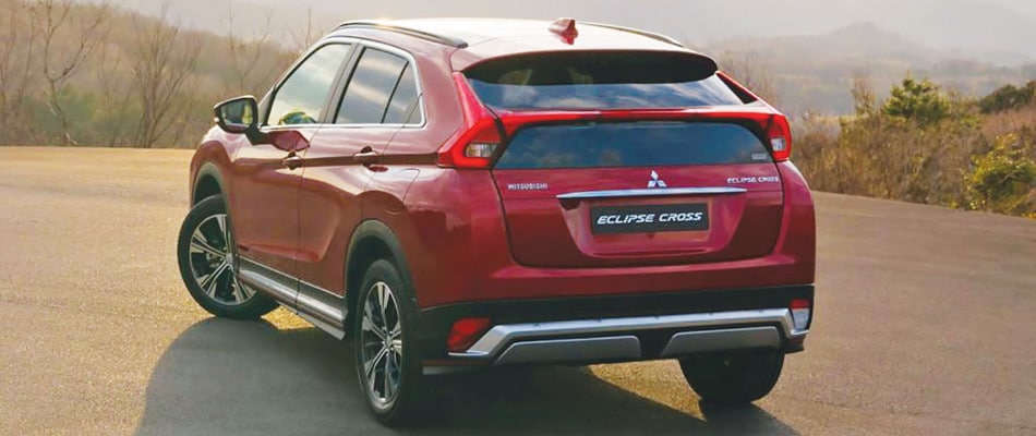 Schedule a Test Drvie at Art Moran Mitsubishi A red Eclipse Cross parked at a look out