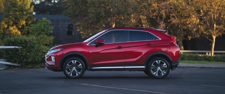 SE vs. SEL A red Mitsubishi Eclipse Cross parked