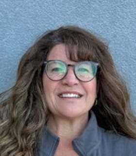 Staff member Nickie Mestas from ebce63b365c6