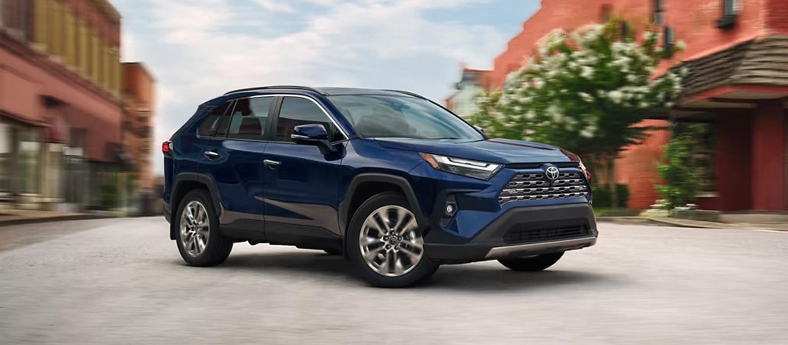 Toyota RAV4 parked in a downtown city road