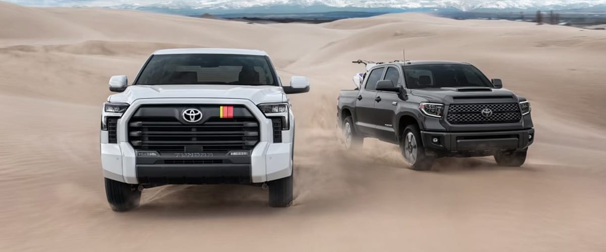 New Toyota Vehicles for Sale in Morgan City, LA Two Toyota Tundras driving through the desert