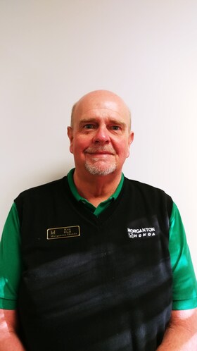 Staff member Ken Hall from b6d646524153